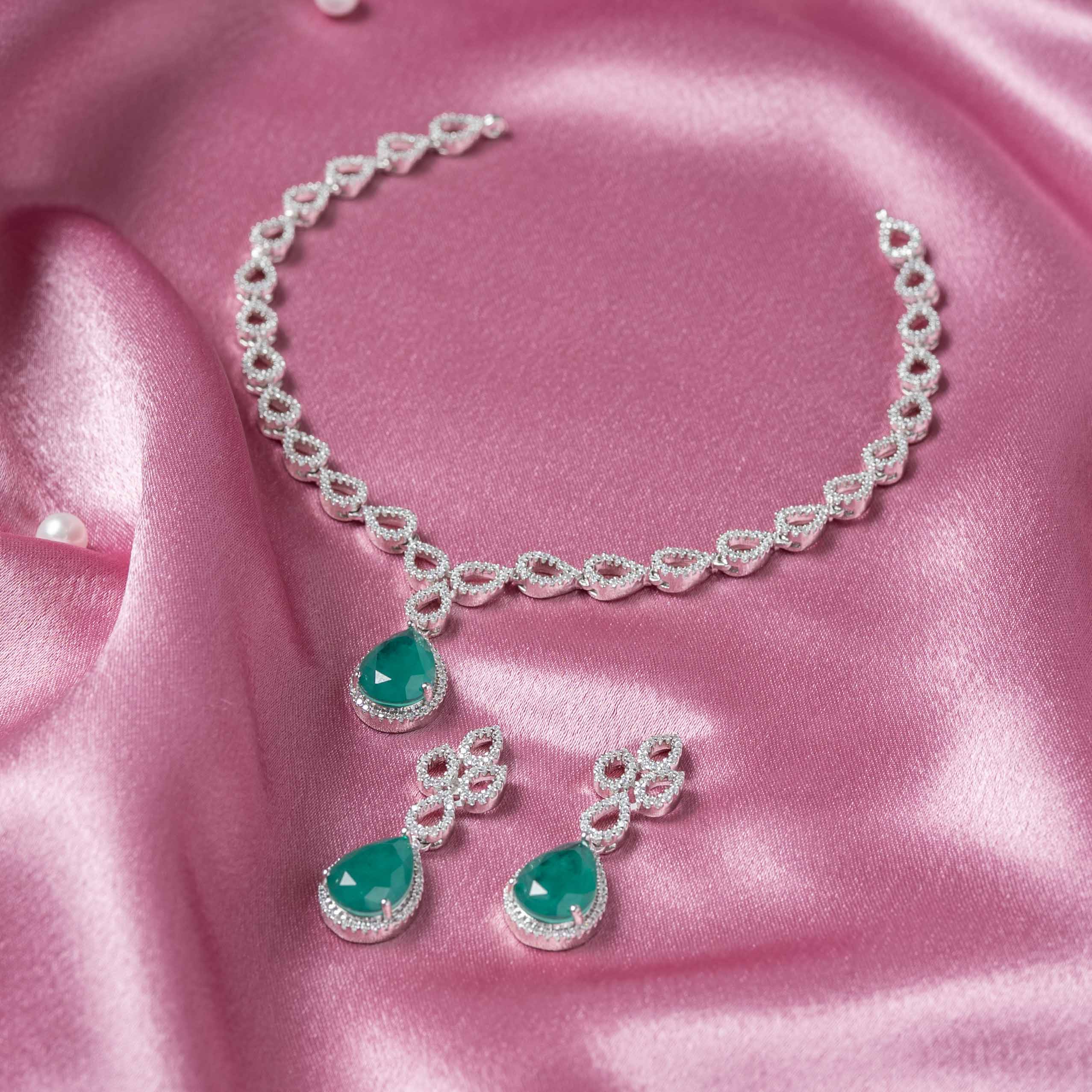 Jivika CZ necklace handcrafted in 925 sterling silver with gold plating, green onyx pendant and matching CZ earrings